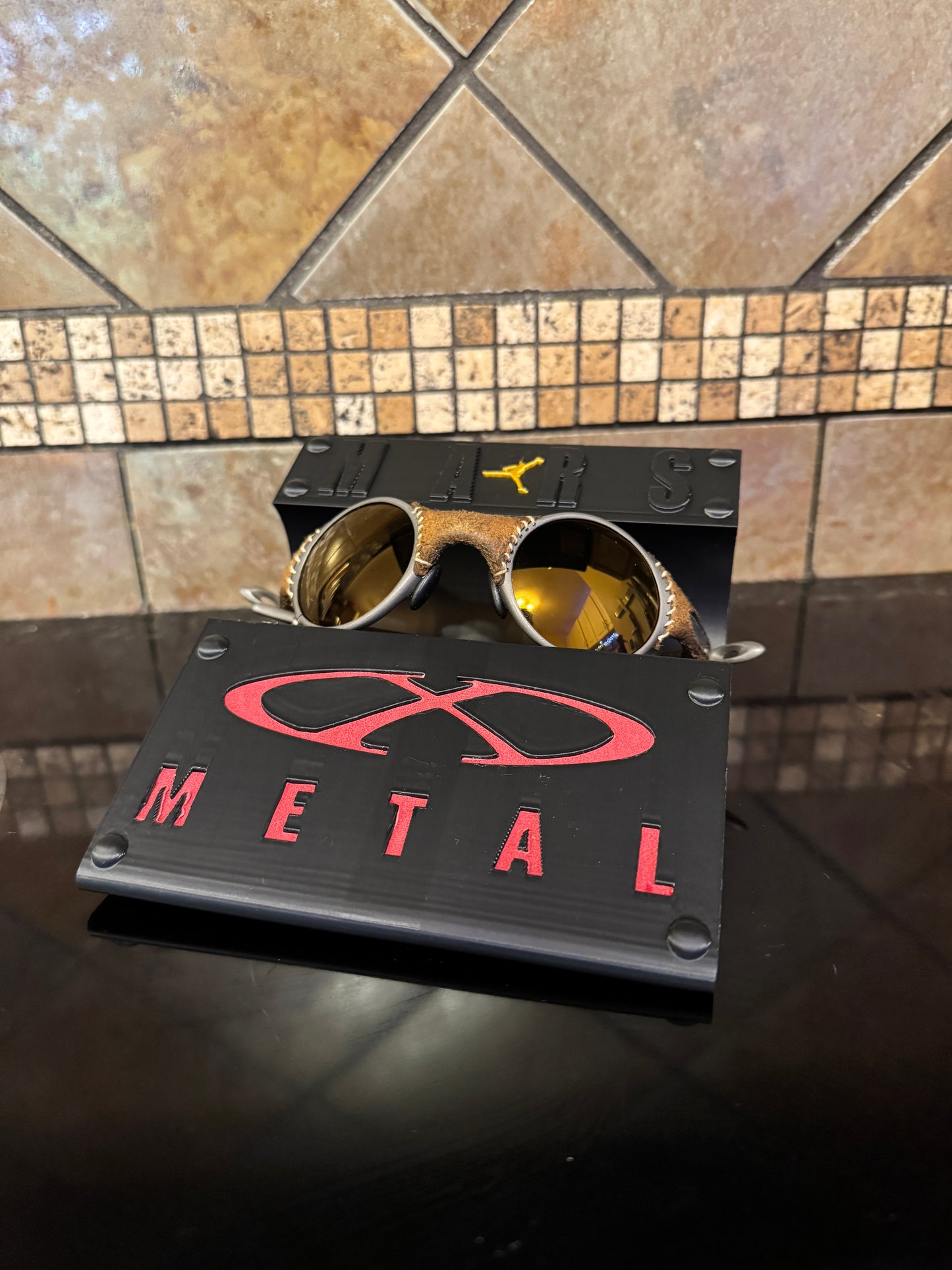 Oaklie Mars Display Stand with Red Leather X-Metal Logo Insert Jordan Logo
