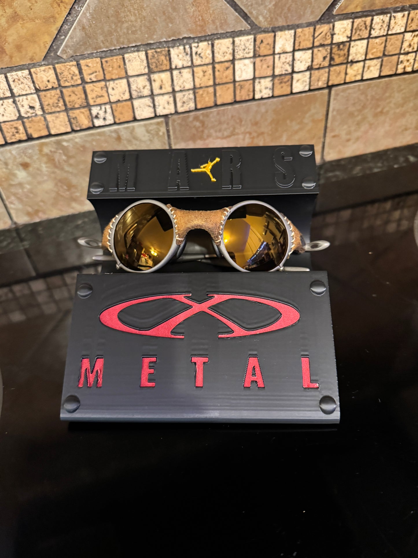 Oaklie Mars Display Stand with Red Leather X-Metal Logo Insert Jordan Logo