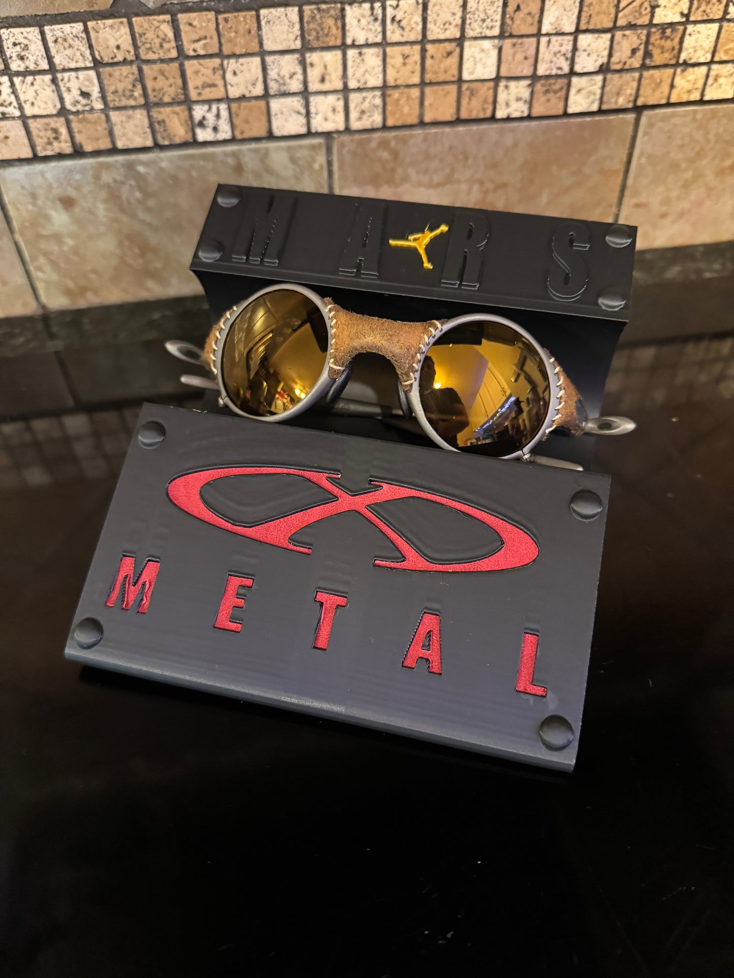 Oaklie Mars Display Stand with Red Leather X-Metal Logo Insert Jordan Logo